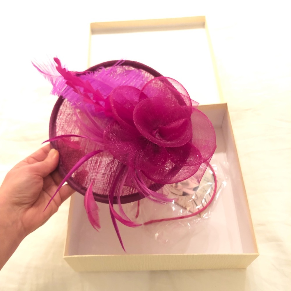 NWT tea hat rasberry/purple color comes with clip and headband
